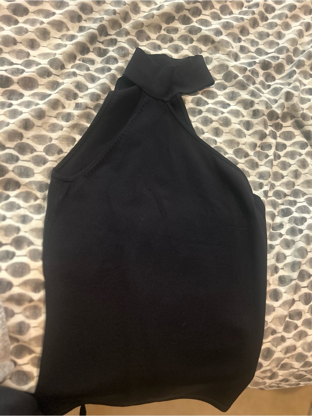 Cache Black Halter Top with Rhinestone buttons on the collar.